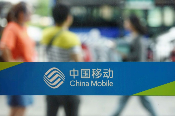 The new Chinese law comes in response to Washington's expansion of a blacklist of companies in which Americans cannot invest, which includes major telecom firms such as China Mobile