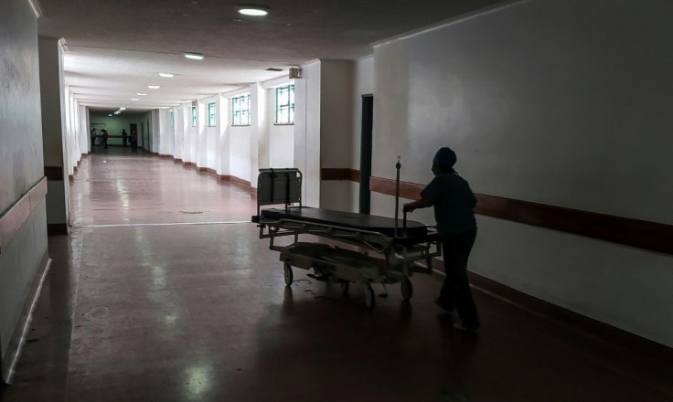 A health worker pushes a stretcher through the corridors of the Clinical University Hospital in Caracas