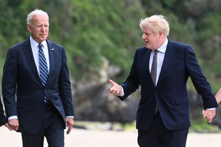 President Biden (l) will attend the G7 summit, on his first foreign trip, along with host Boris Johnson, seen here in Cornwall on Thursday