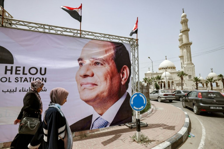 A giant banner depicting Egypt's President Abdel Fattah al-Sisi is seen on display in Gaza City on May 31, 2021