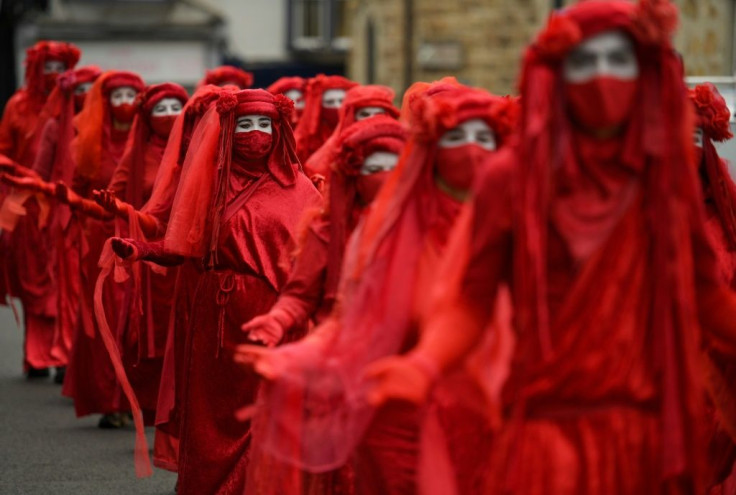 Activists from the climate change protest group Extinction Rebellion rallied near the venue