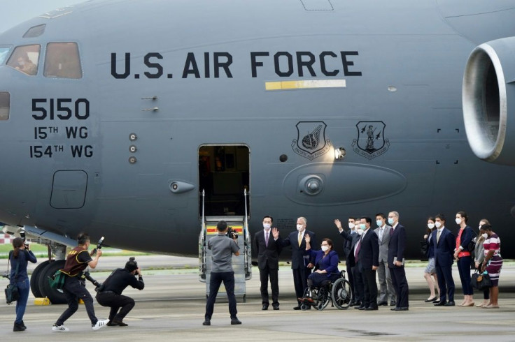 A delegation comprised of Senators Tammy Duckworth, Christoper Coons and Dan Sullivan pose for photographs with Taiwanâs Foreign Minister Joseph Wu on flying into Taipei on a military plane on June 6, 2021.