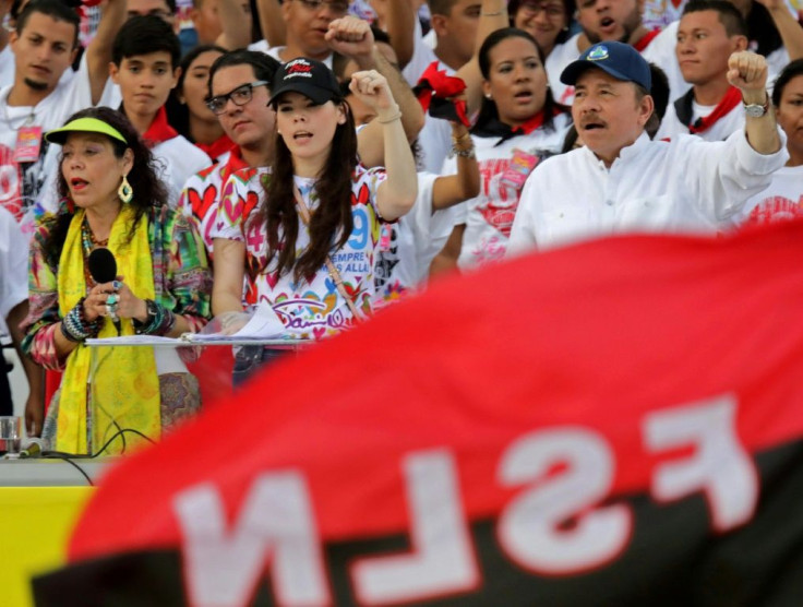 Nicaraguan President Daniel Ortega, his wife, Vice President Rosario Murillo, and their daughter Camila Ortega attend the commemoration of the 40th anniversary of the Sandinista Revolution in 2019 in Managua