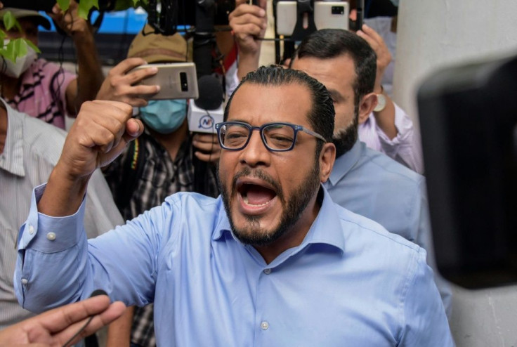 Nicaraguan presidential candidate Felix Maradiaga gestures as he arrives at the Attorney General's office amid a clampdown on opposition