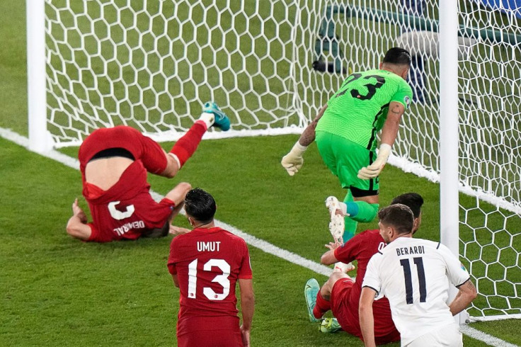 Turkey's defender Merih Demiral (L) turned into his own net against Italy