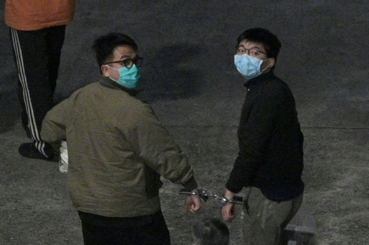 Fellow youth activists Joshua Wong (R) and Ivan Lam (L) were sentenced in the same case Agnes Chow