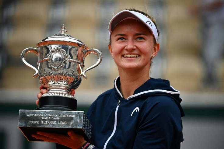 Champion: Czech Republic's Barbora Krejcikova celebrates with the Suzanne Lenglen Cup