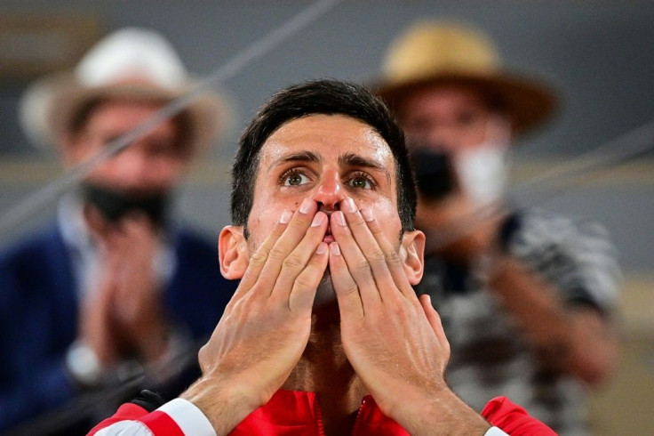 Man of the moment: Novak Djokovic celebrates after defeating Rafael Nadal