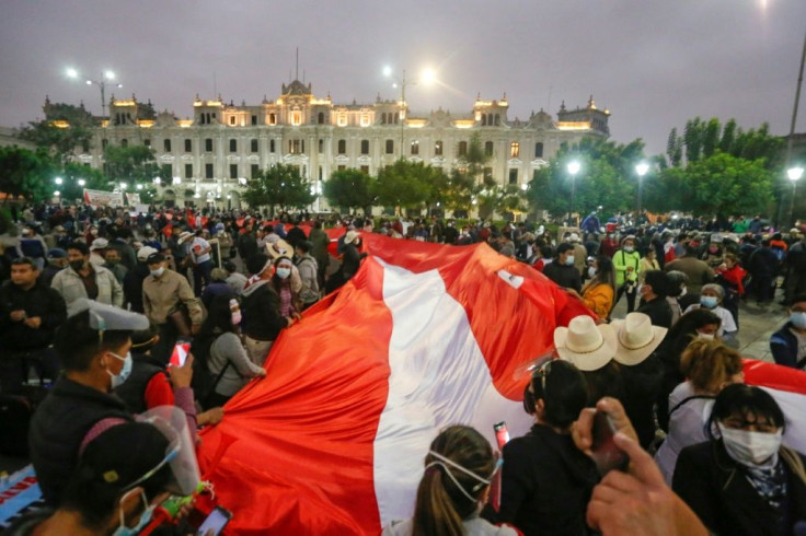 Castillo supporters rallied outside the election jury offices in Lima as it weighs objections to the presidential vote count