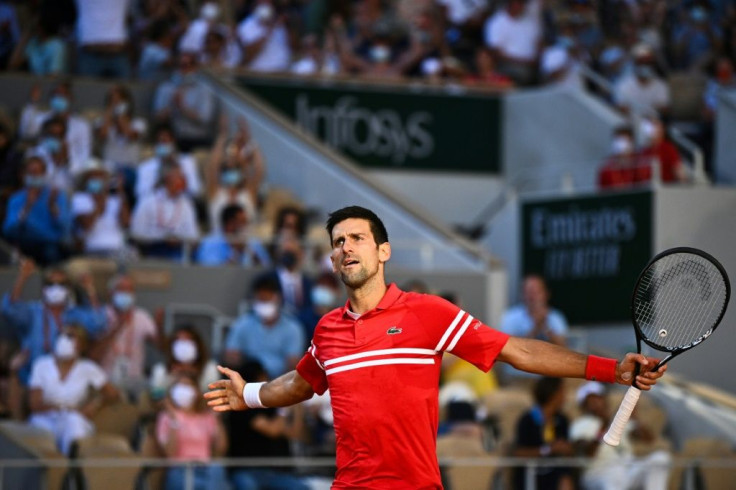 Champion: Novak Djokovic reacts
