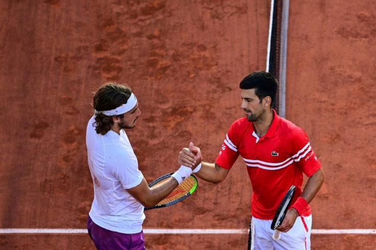 It's all over: Novak Djokovic with Stefanos Tsitsipas