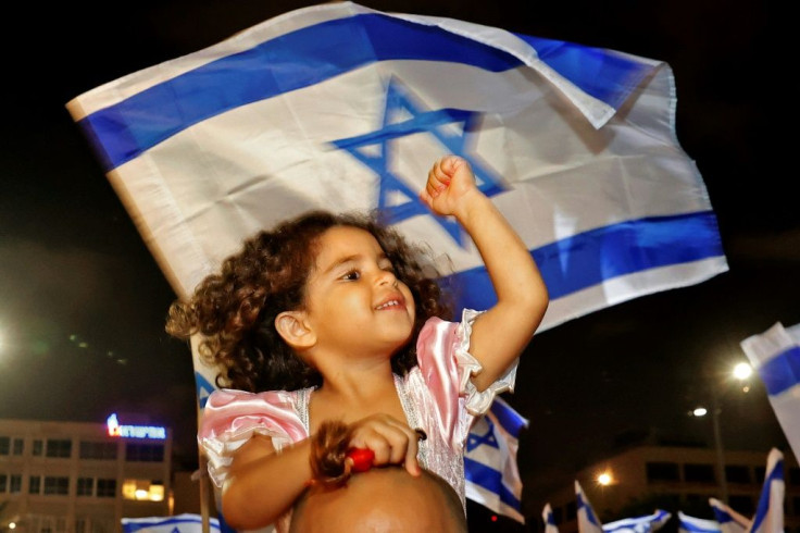 Mothers and fathers brought their children to the party, despite the late hour saying it seemed so important