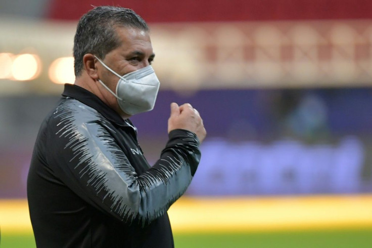 Venezuela's Portuguese coach Jose Peseiro surveys the field at Mane Garrincha Stadium in Brasilia