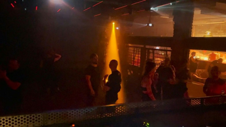 The Distillery, a nightclub in Leipzig, reopens for a few days as a pilot project with 200 people allowed to party without masks and without social distancing, but only after presenting proof of two negative Covid-19 tests.