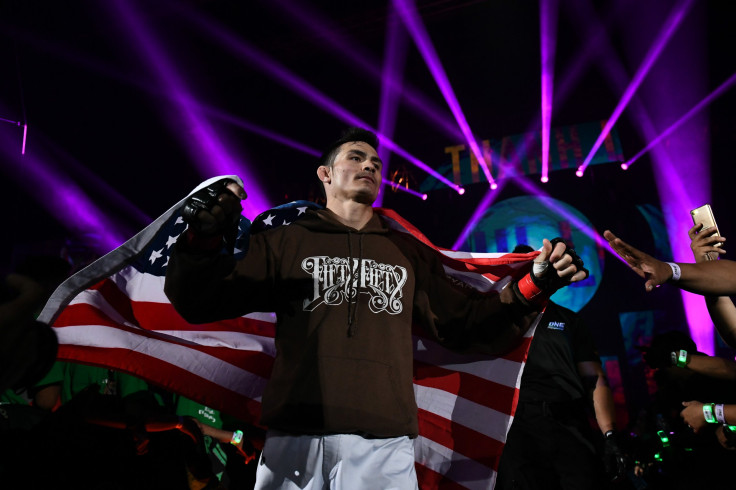 Thanh Le of Vietnam/USA (red) prepares before a fight against Yusup Saadulaev of Russia (blue) during ONE Championship Feather Weight at Istora Senayan on May 03, 2019