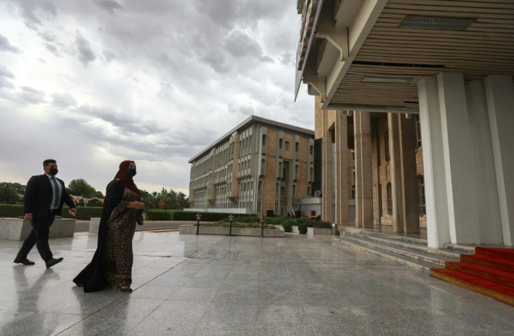 Iraqi Kurdistan parliament speaker Rewaz Faiq, one of only two women to hold the post in the Middle East,  arrives for a session