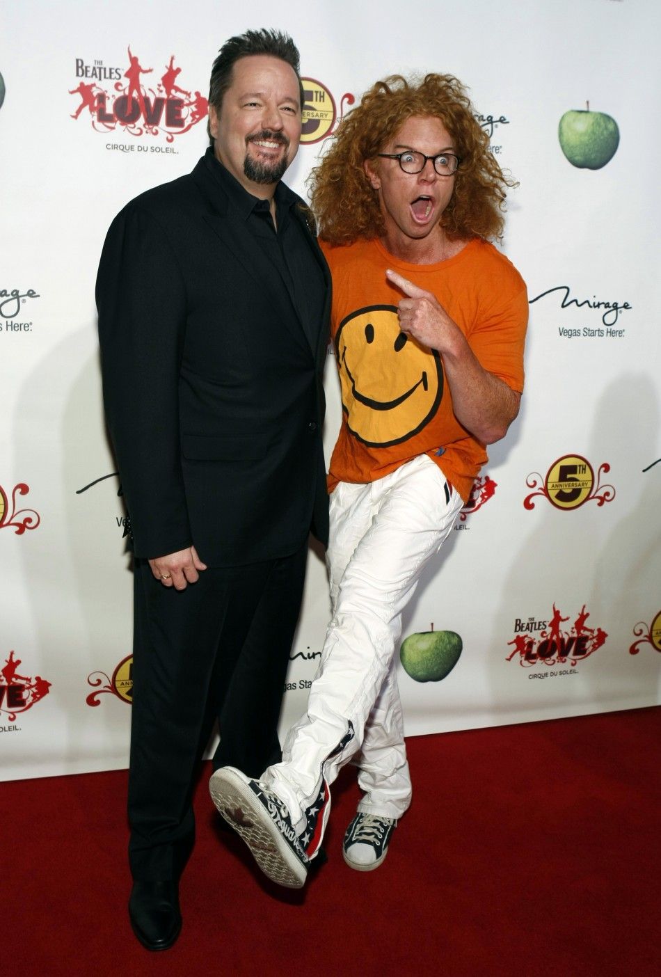 Ventriloquist Terry Fator and comedian Carrot Top R arrive for the fifth anniversary celebration of quotThe Beatles LOVE by Cirque du Soleilquot show at the Mirage Hotel and Casino in Las Vegas, Nevada June 8, 2011.