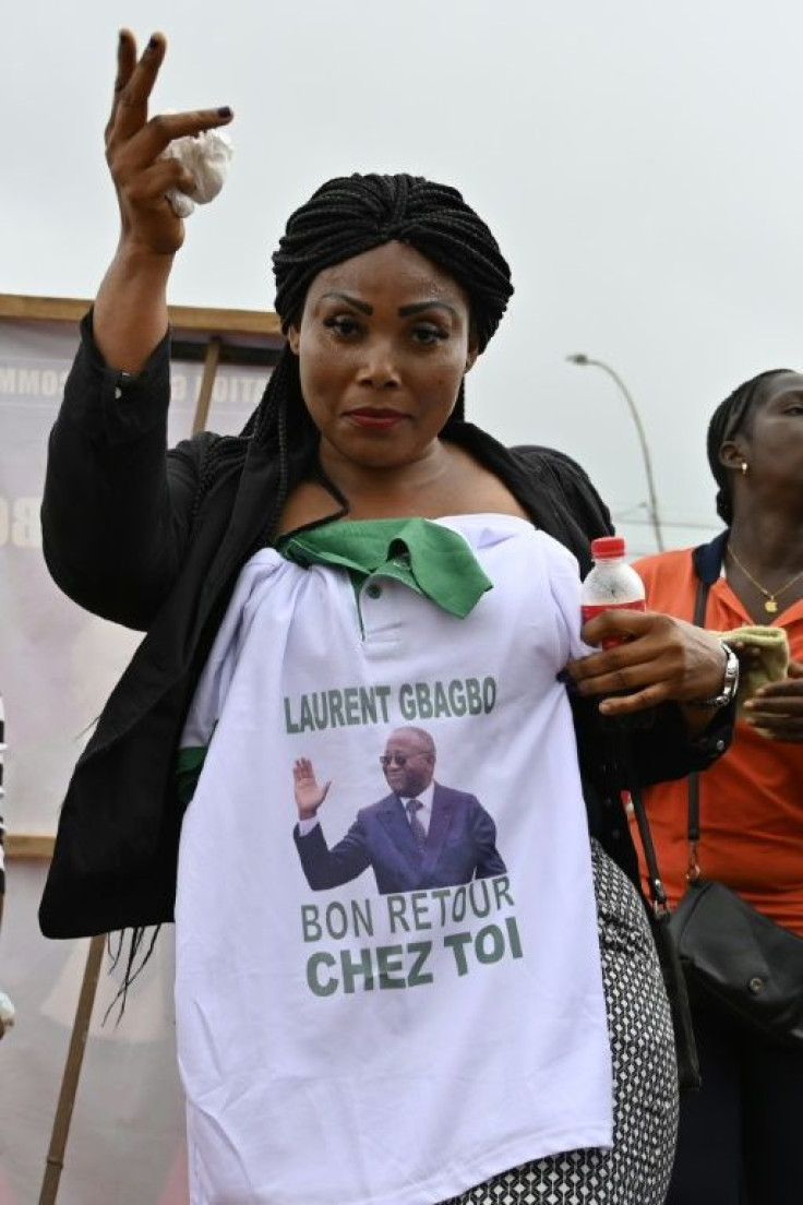 Welcome home: Gbagbo's image is emblazoned on T-shirts, caps and caftans