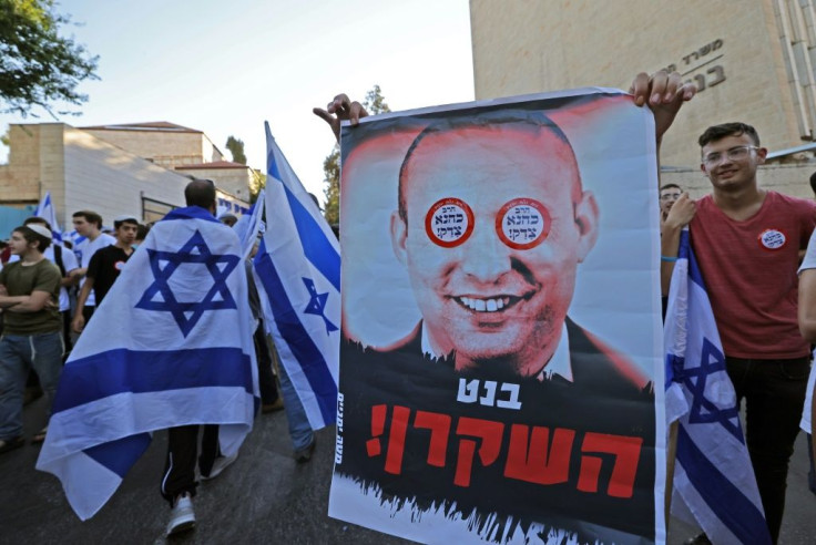 Some demonstrators held posters showing new Prime Minister Naftali Bennett, reading "Bennett the liar"