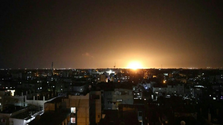 IMAGES An explosion lights up the night sky in Khan Yunis, in the southern Gaza Strip, as Israeli forces shell the Palestinian enclave. The Israeli air force launched air strikes in response to incendiary balloons sent into southern Israel from Gaza, secu