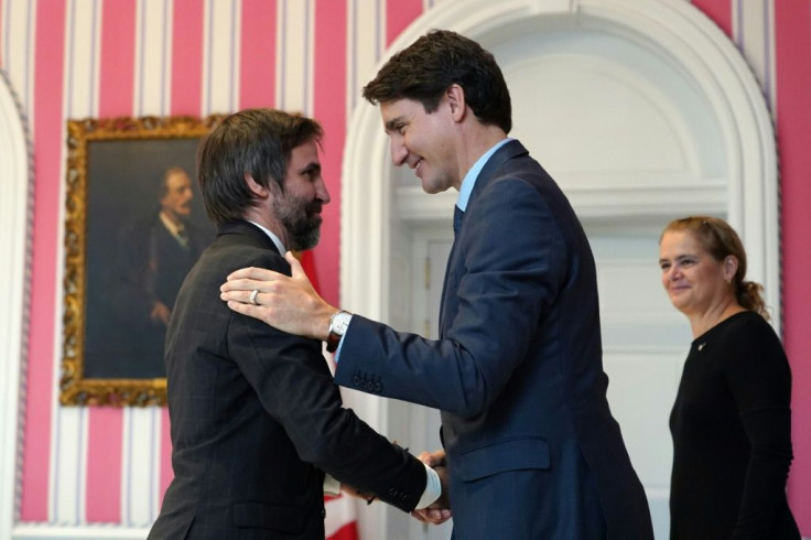Canadian Heritage Minister Steven Guilbeault, pictured (left) with Prime Minister Justin Trudeau in 2019, says the government is working to hold adult websites to account for their content