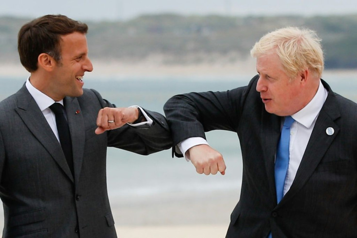 Boris Johnson (R) clashed with European leaders like France's Emmanuel Macron at the weekend in the so-called 'sausage war'