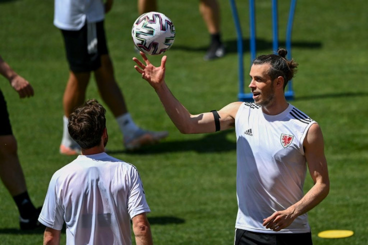 Wales captain Gareth Bale (right) takes part in a training session in Baku