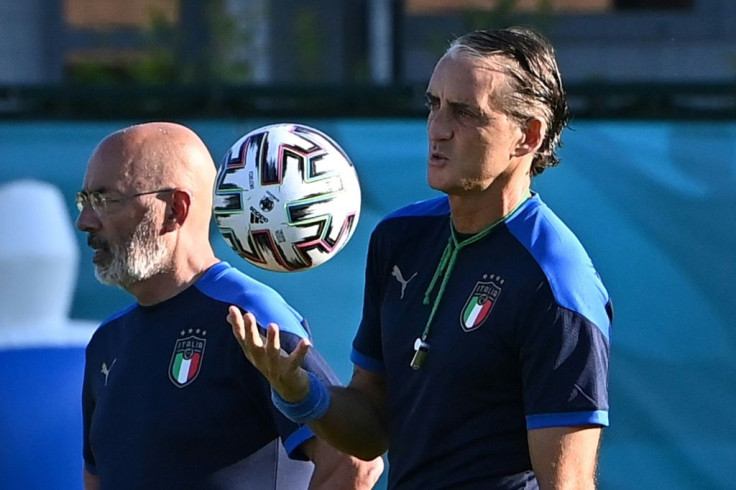 Italy coach Roberto Mancini (right) is eyeing the Euro 2020 knockout phase