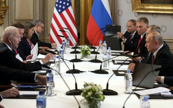 US President Joe Biden (L) told Russian President Vladimir Putin (R) in their Geneva summit that he would not tolerate more attacks on US infrastructure from Russia-based ransomware extortionists
