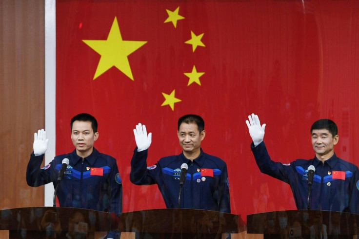 The first Tiangong crew includes Nie Haisheng (C), Liu Boming (R) and Tang Hongbo