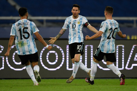 Argentina's Lionel Messi (C) celebrates with teammates Nicolas Gonzalez (L) and Giovani Lo Celso 