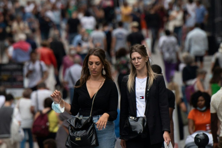 Unmasked: Pedestrians in downtown Nantes, western France, on Thursday