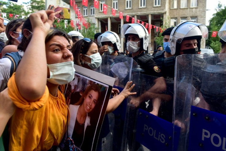 Scuffles broke out between the protesters and riot police, with several people detained