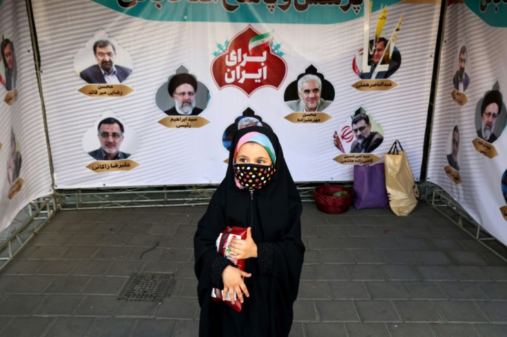 Out of an initial field of almost 600 hopefuls for the presidency, only seven, all men, were approved to run by Iran's Guardian Council but three of them have dropped out of the race on the eve of the election