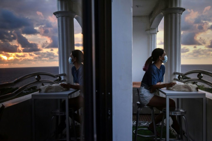 Tanya Mariano traded her Manila flat for an ocean-view apartment north of the Philippines capital, part of an exodus of digital workers attempting to escape virus restrictions and congested living conditions
