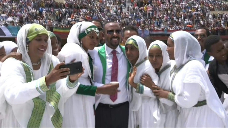 IMAGES Ethiopian Prime Minister Abiy Ahmed appears before thousands of supporters at a last campaign event ahead of general elections on 21 June, in the southern city of Jimma.