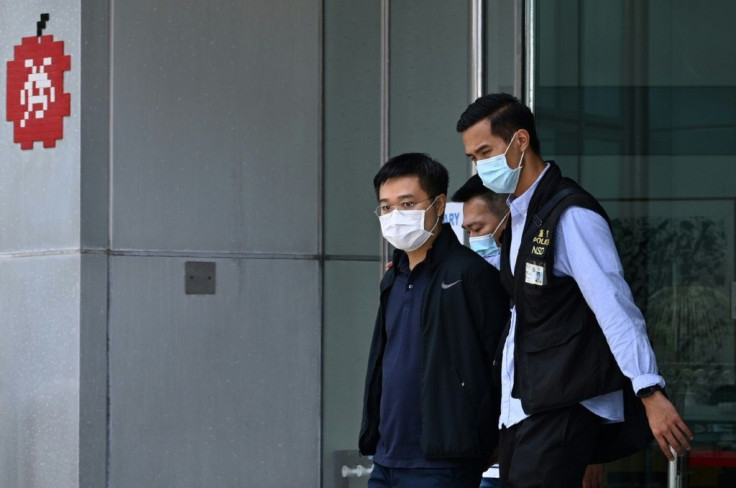 Some 500 officers descended on Apple Daily's newsroom, bundling computers and notepads into evidence bags