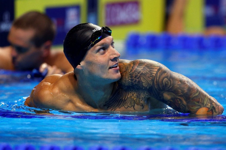 Caeleb Dressel reacts after winning the 100m butterfly at the US Olympic swimming trials