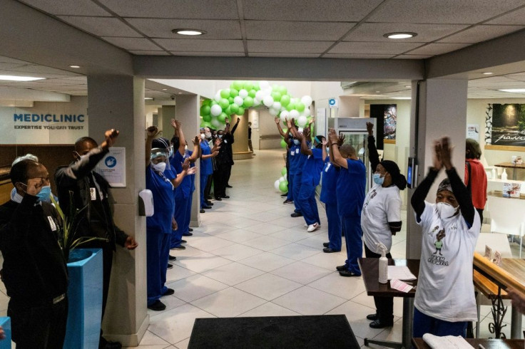 Staff sing and cheer after the arrival of Rodwell Khomazan at the Mediclinic Sandton Hospital where he will undergo surgery to reconstruct his face
