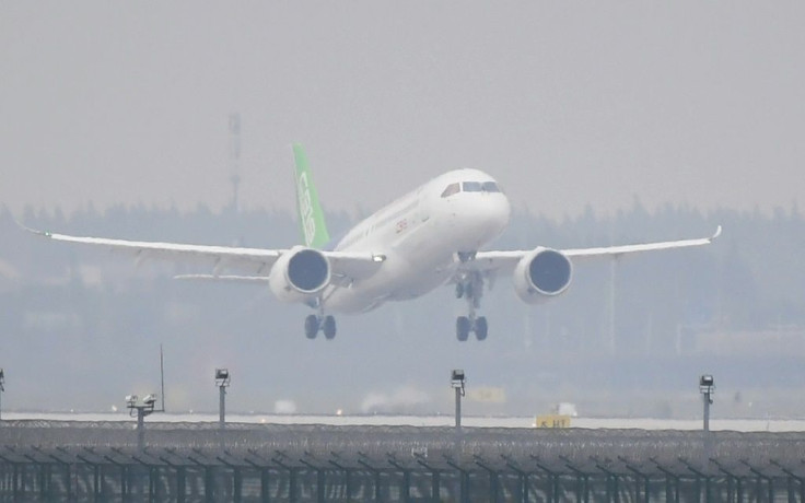 China's home-grown C919 passenger jet taking off from Shanghai's Pudong International Airport on its maiden flight in 2017