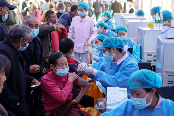 People receive Covid-19 vaccines in China's southwestern city of Chongqing