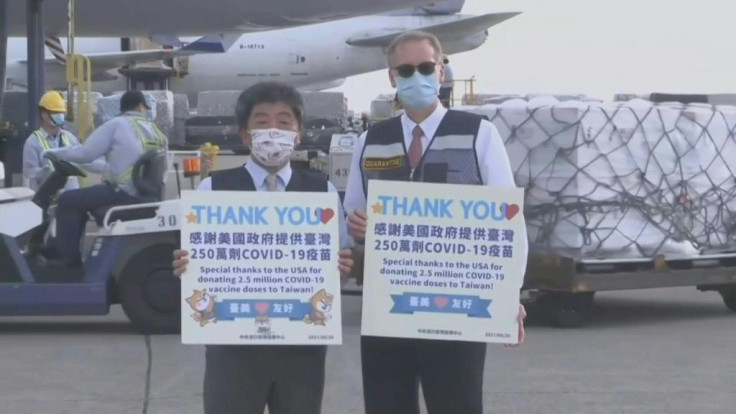IMAGES: Taiwan receives 2.5 million doses of the Moderna vaccine from the US at Taoyuan International Airport, with health officials holding up signs saying 'thank you'. The move is likely to draw disapproval from Beijing, which claims the self-ruled isla