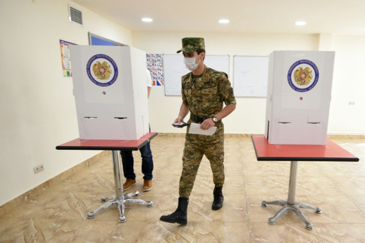 A soldier votes: More than 6,500 people were killed in the war