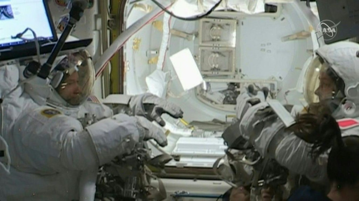 French astronaut Thomas Pesquet and US astronaut Shane Kimbrough make their way back inside the International Space Station after going on a spacewalk to complete the installation of new solar panels to boost power supplies to the ISS.