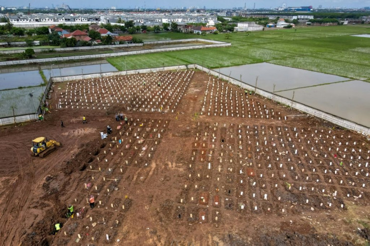 A funeral at a cemetery for Covid-19 coronavirus victims in Jakarta
