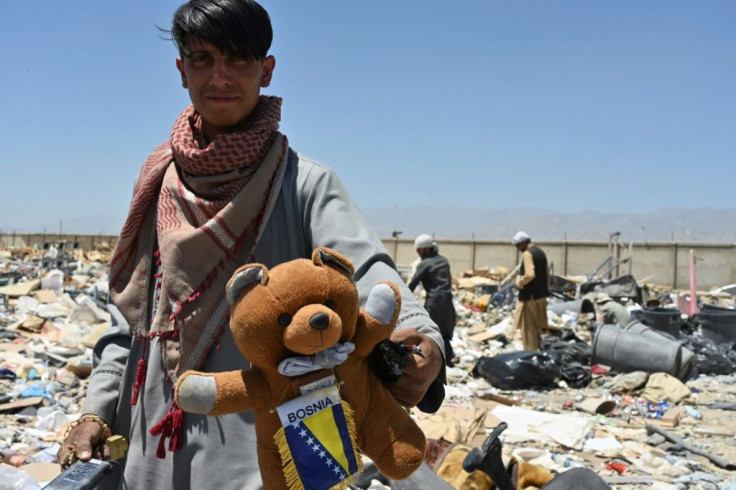 Scrap dealers say nothing goes to waste from Bagram's discarded equipment, including furniture, gym equipment, and even teddy bears