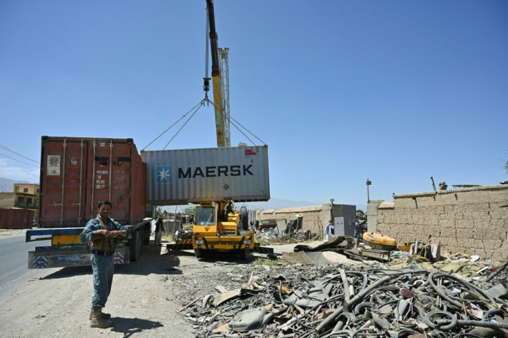 The road to Bagram is lined with dozens of scrap businesses