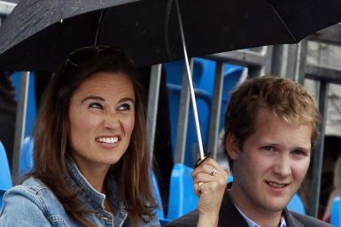 Pippa Middleton, sister of Catherine, Britain&#039;s Duchess of Cambridge reacts before a rain break at the Queen&#039;s Club Championships in west London June 9, 2011.