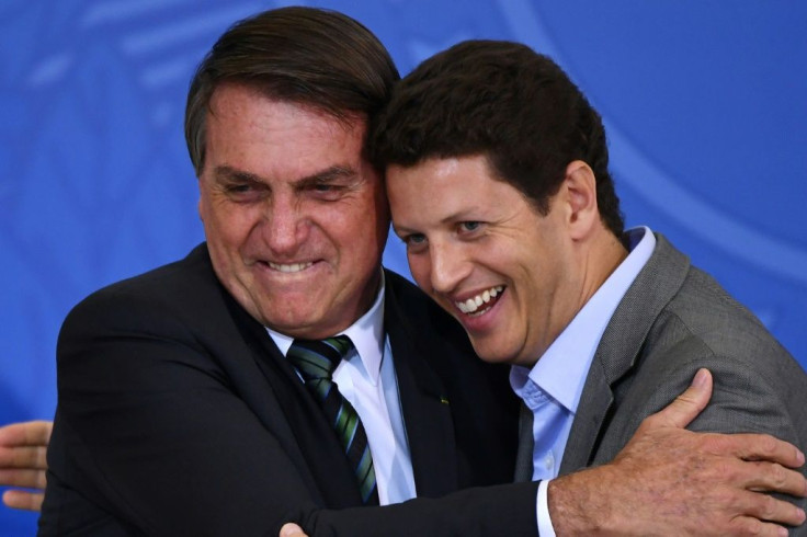 Brazilian Environment Minister Ricardo Salles, pictured (right) with President Jair Bolsonaro, was one of the most divisive figures in the government