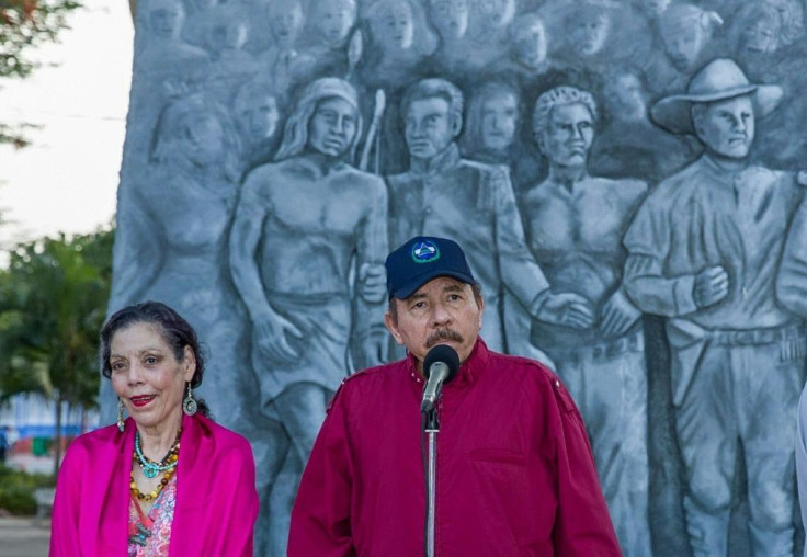 Nicaraguan President Daniel Ortega (R) and his wife Vice-President Rosario Murillo attend an anniversary ceremony for the birth of Sandinista leader Carlos Fonseca Amador in Managua on June 23, 2021